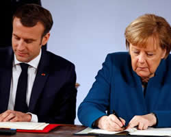 Macron y Merkel firman el tratado de Aquisgrán.